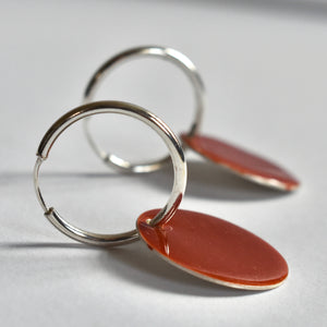 Hoop and  and orange enamelled disc earrings