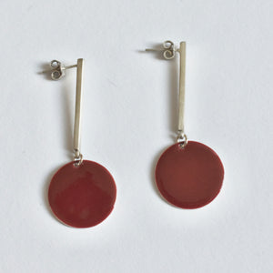 Dark red enamelled disc earrings with rods